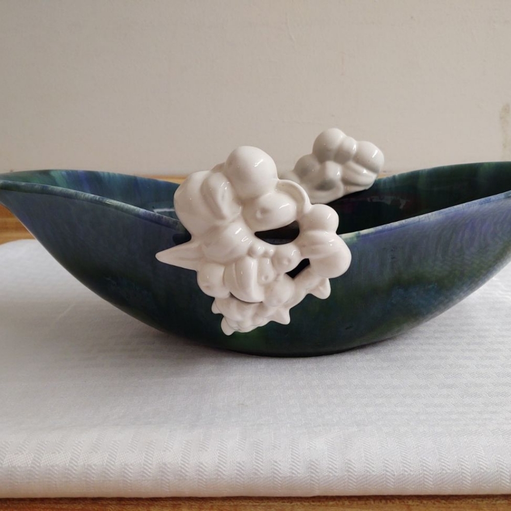 Royal Haeger large console bowl; blue greens, white fruit, handles.